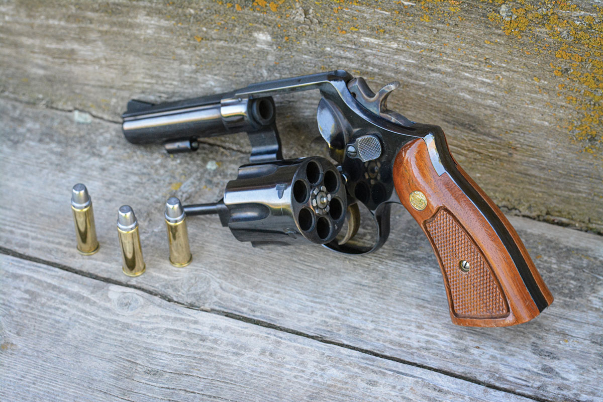 The Smith & Wesson Model 58 was built on the N-frame, featured a 4-inch barrel, service (a.k.a. fixed) sights, standard trigger and hammer and service stocks.